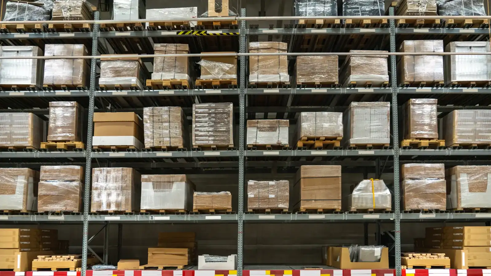 Stocked warehouse racking in a back-of-house storage area