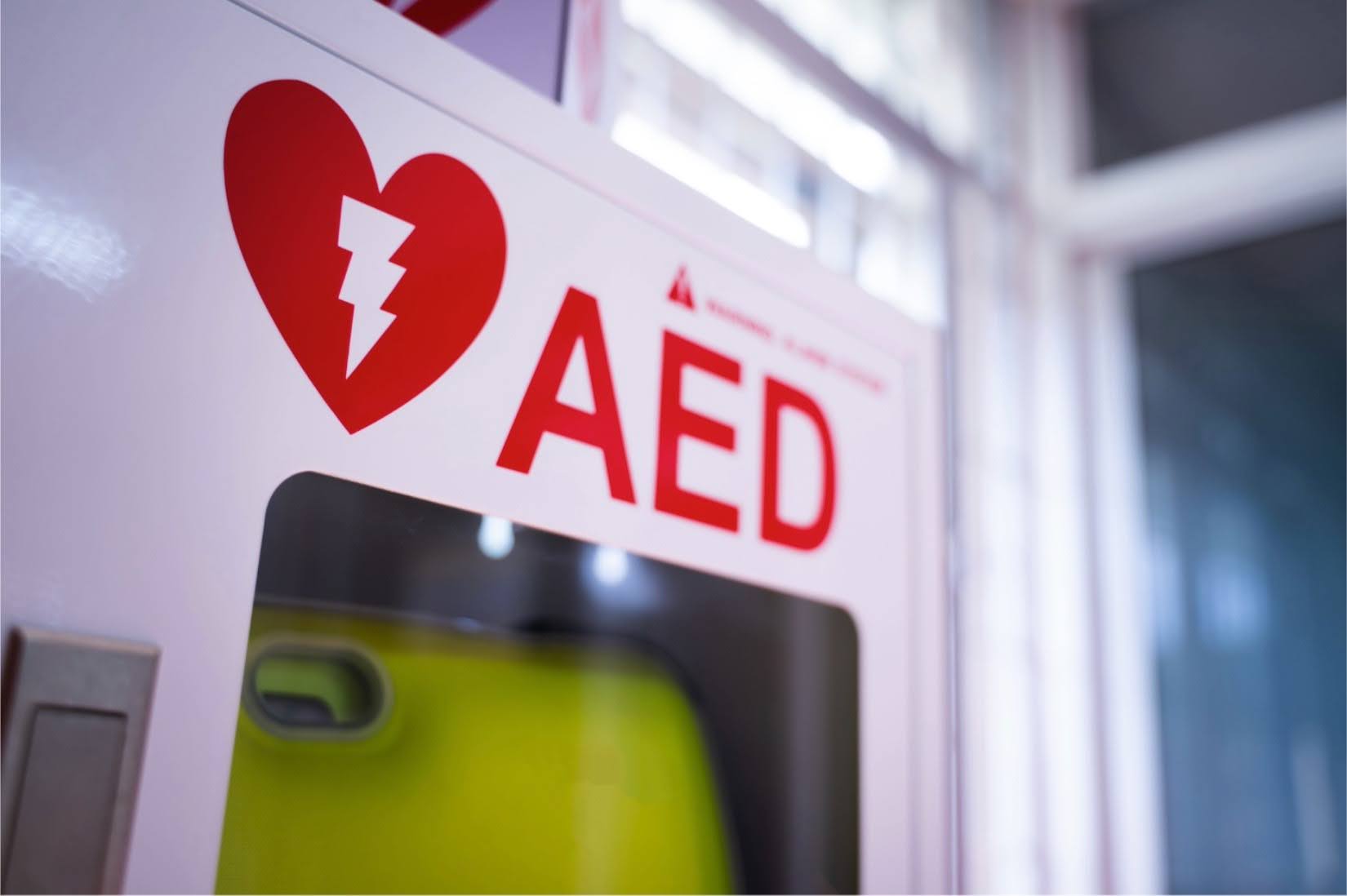 AED Cabinets and Panic Buttons: The Two Signals a Hospital Should Never Relay by Hand